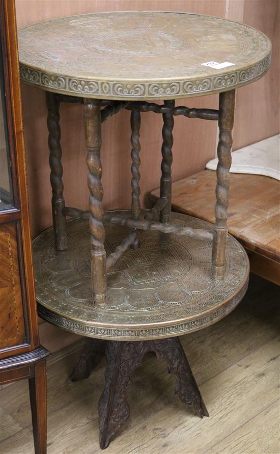 Two Middle Eastern circular brass top tables W.60cm